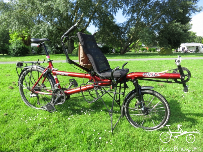 A Hase Pino semi recumbent tandem bike in the grass at the camp site of Saint Avertin near Tours in France, on the Loire à Vélo