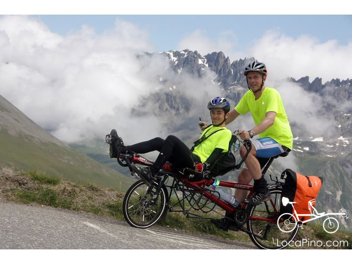 Deux cyclists climbing the col du Galibier on a semi recumbent Hase Pino tandem bicycle